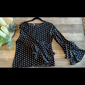 Cute polka dot blouse with super fun sleeves!